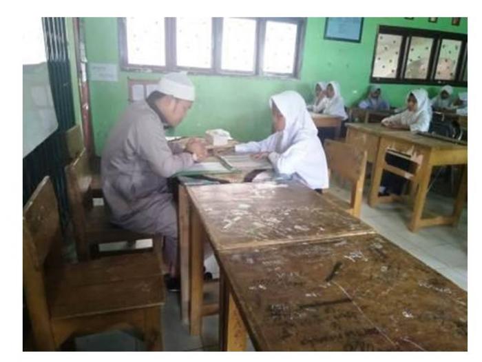 KEGIATAN TES BACA AL QURâ€™AN MENGAWALI PROGRAM PENDIDIKAN BANK BSM 
