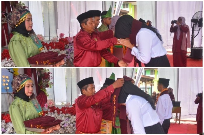 Prosesi Sakral, 69 Siswa Angkatan ke-17 MTsN 6 Batang Hari Resmi Dikalungi Medali Simbol Pelepasan 